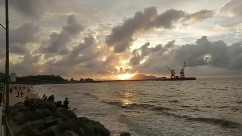 Silhouettes on the beach during sunset Stock Footage 268130847