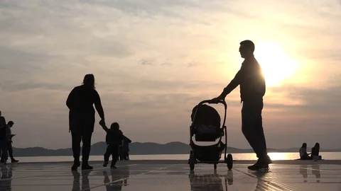 Silhouettes in the beach  Stock Footage 81065699