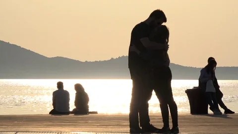 Silhouettes in the beach  Stock Footage 81066039
