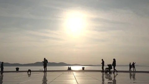 Silhouettes in the beach  Stock Footage 81066133