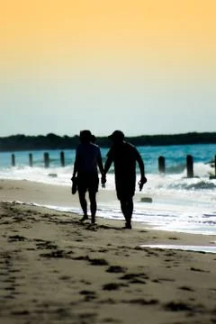 Silhouettes on the Beach Stockfoto's