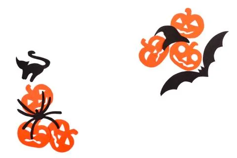 Silhouettes of black volatile bat, hat, cat, spider and orange pumpkins, carved Stock Photos