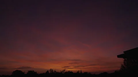 Silhouettes of Buildings on Intense Sunset Stock Footage 259224891