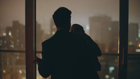 Silhouettes couple dancing date evening cityscape kitchen closeup. Spouses dance Stock Footage 276241673