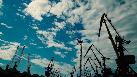 Silhouettes of Cranes Working in the Port Stock Footage 69816239