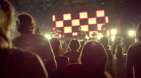 Silhouettes dancing at concert 스톡 동영상 63084292