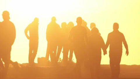 Silhouettes of different people on the observation deck in the light of the Stock Footage 303882164