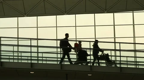 Silhouettes of Family Travellers in Airport Stock Footage