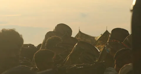 Silhouettes of Indian Poor workers with Cans on Hill Stockbeeldmateriaal 326848348