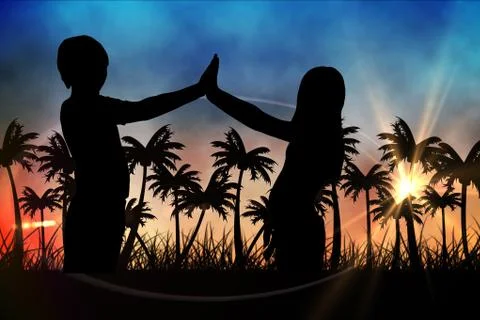 Silhouettes of  kids  against sunset view with palm trees Stock Photos