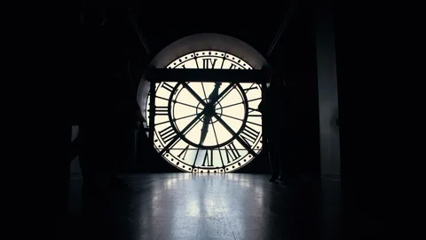Silhouettes of people by the big clock in Orsay museum of Paris, France Stock Footage 101631006