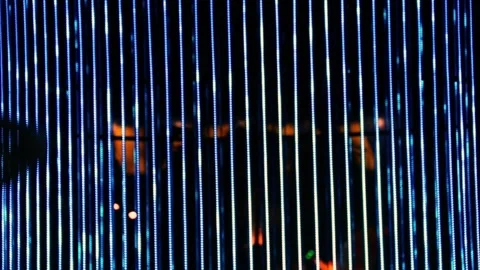 Silhouettes of people under blue light strips Stock Footage 329952208