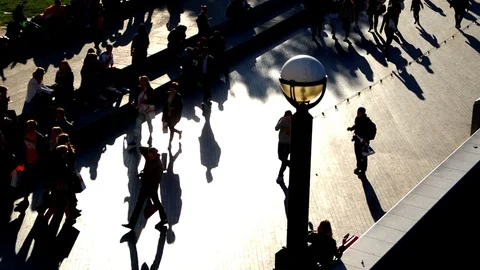 Silhouettes of people walking along Tower Bridge's walkway. Time Lapse Stock Footage 112753870