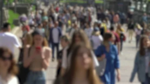 Silhouettes of people walking in a crowd Stock Footage 154747403