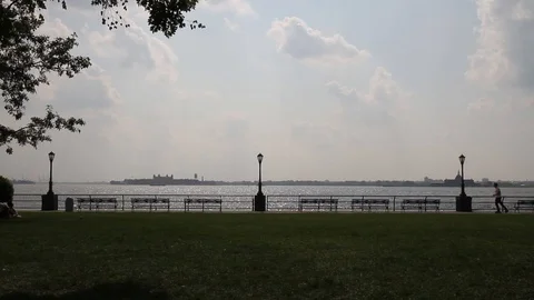 Silhouettes of people walking by Stock Footage 103057288