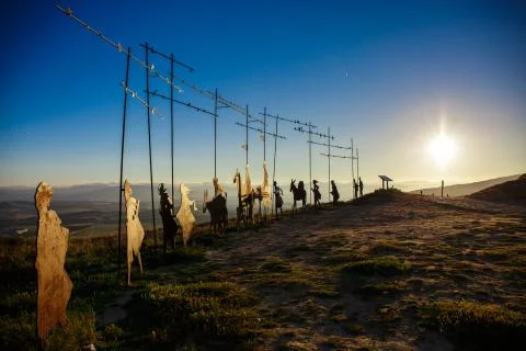 Silhouettes of pilgrims Stock Photos