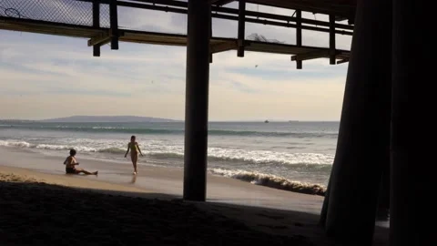 The silhouettes of the pillars under the pier; Stock Footage 234067493