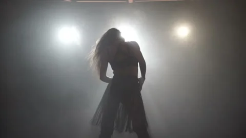 Silhouettes of a professional dancer 库存影片 87802101