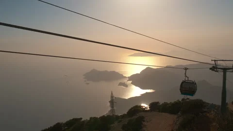 Silhouettes of rope cabins in evening. Stock-Footage 250555736