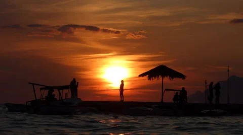 Silhouettes sunset on the pier Video stock 50584612