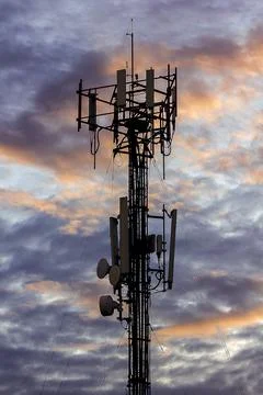 Silhouettes of tower antenna. Stock Photos