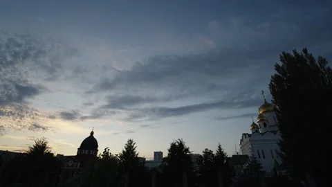 The silhouettes of two Orthodox churches, with dark and golden domes Stock Footage 337837961