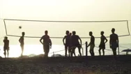 Silhouettes Of Volleyball Players On The Beach At Sunset - 6 Stock Footage