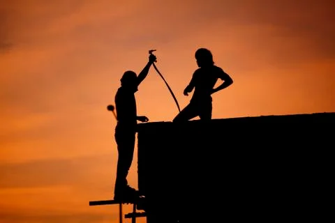 Silhouettes of worker welder 写真素材