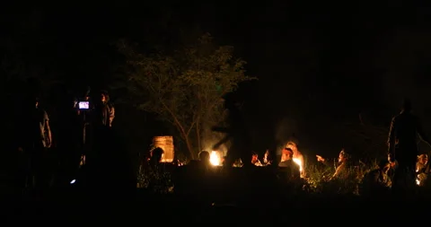 Silhouettes of workers at Campfire 스톡 동영상 339777379