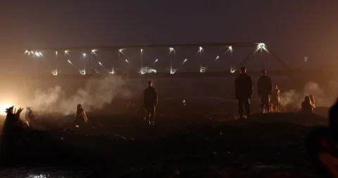 Silhouettes of workers at Campfire Vídeo Stock 340412091