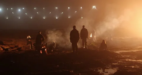 Silhouettes of workers at Campfire 스톡 동영상 340412124