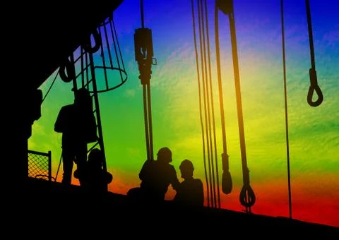 Silhouettes of workers at a construction site Stock Illustration