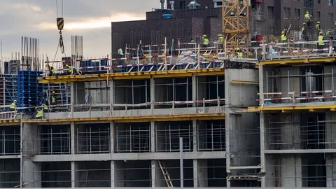 Silhouettes of workers-installers on the construction of the building Stock Footage 126056986