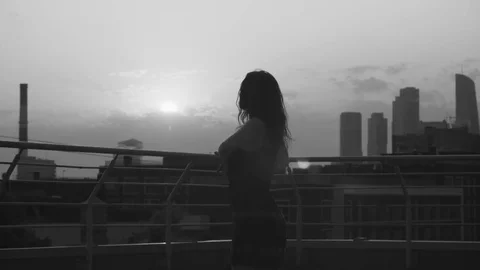 Silhouettes of young couple dancing on sunset Video stock 79169879