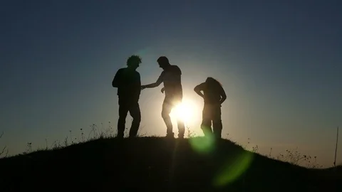 Silhouettes of Young Men Having Fun In Natural Environment Stock Footage 87998000