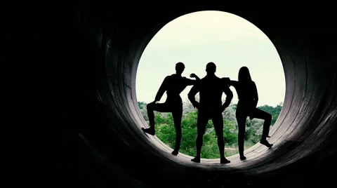 Silhouettes of young people on the background of a large hole Video stock 64720165