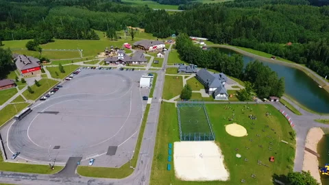 SILICHY, BELARUS - 2, AUGUST, 2019: Air view of the ski center Silichi. View of Stock Footage 129944514