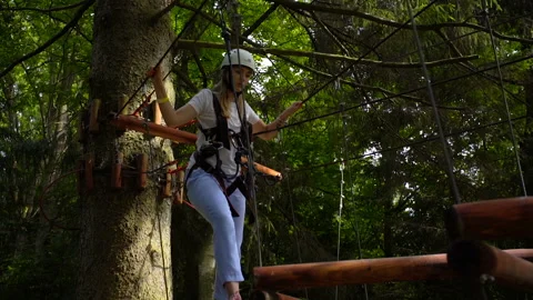 SILICHY, BELARUS - 2, AUGUST, 2019: A girl in a white helmet holds on to the Stock Footage 129953379