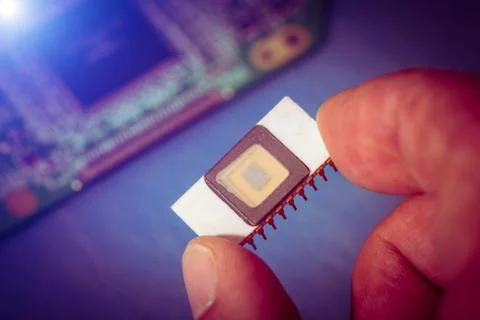 Silicon ceramic chip in the hand 스톡 사진