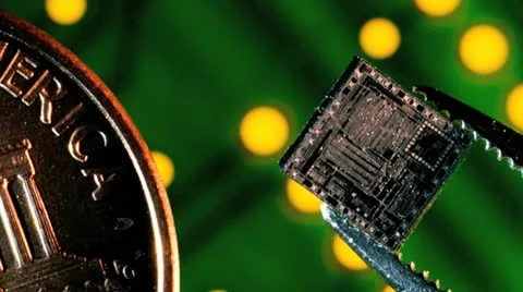 Silicon ic chip sized next to penny Stock Footage 20545118