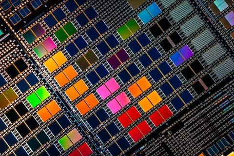 Silicon semiconductor wafer with integrated circuit die mosaic pattern. Stock Photos
