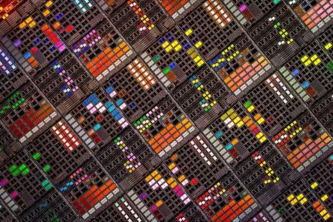 Silicon semiconductor wafer with integrated circuit die mosaic pattern. Stock Photos