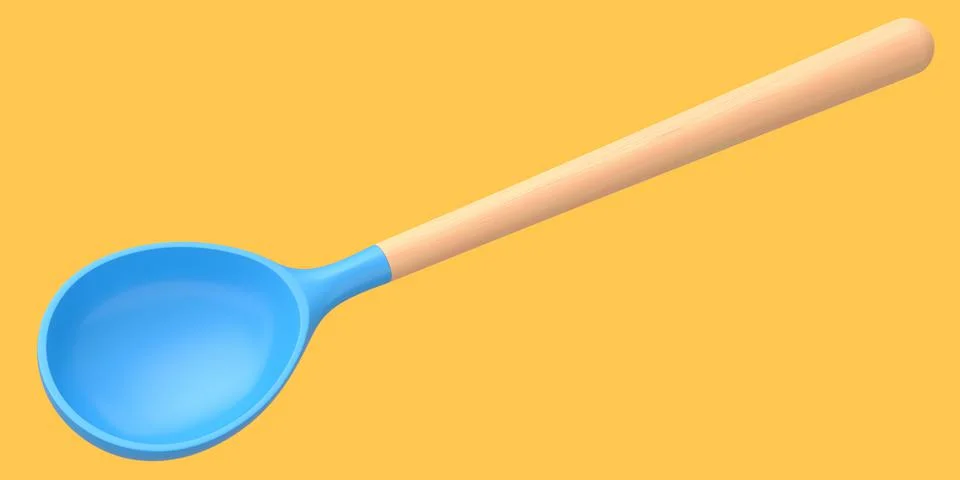 Silicon solid spoon or kitchen utensils on orange background. 스톡 사진