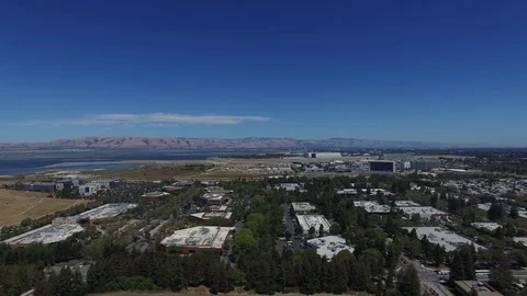 Silicon Valley Google HQ Campus, Moffett Airfield, Bay and Freeway Aerial Drone Stock Footage 72802546