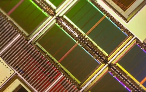 Silicon wafer with microchips used in electronics for the fabrication of in.. Stock Photos