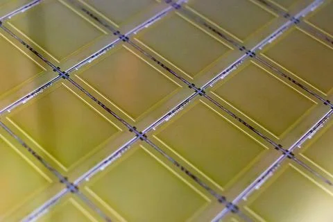 Silicon Wafer with microchips - A wafer is a thin slice of semiconductor mate Stock Photos