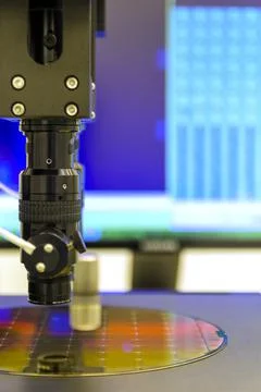 Silicon wafer with semiconductor microchip on machine process examining testi Stock Photos