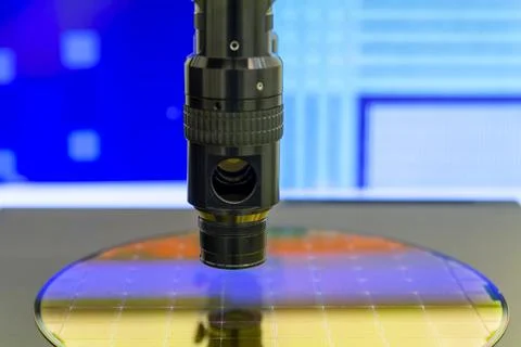 Silicon wafer with semiconductor microchip on machine process examining testi Stock Photos