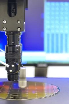 Silicon wafer with semiconductor microchip on machine process examining testi Stock Photos