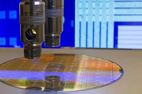Silicon wafer with semiconductor microchip on machine process examining testi Stock Photos